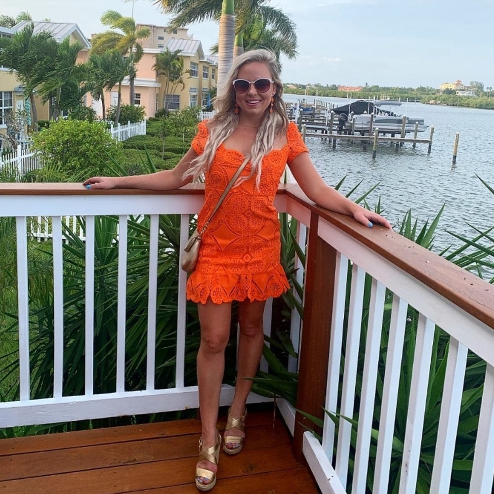 Bright orange lace dress